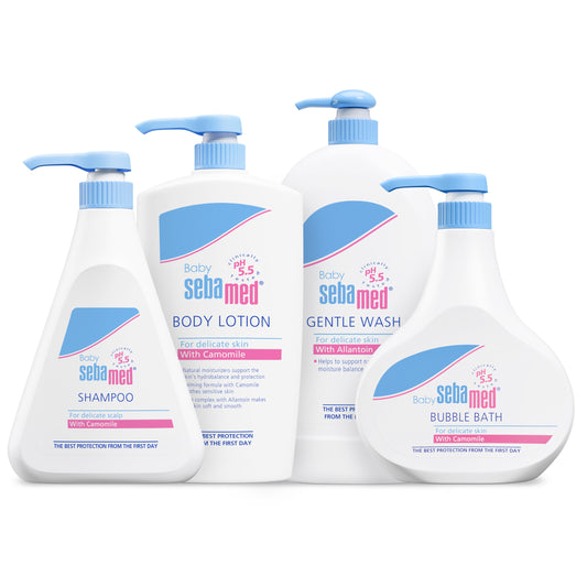 Set of Baby Sebamed products including shampoo, body lotion, gentle wash, and bubble bath on a white background.