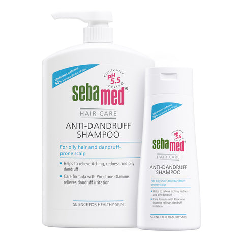 Bottles of Sebamed Anti-Dandruff Shampoo - for oily hair and dandruff prone scalp - on a white background
