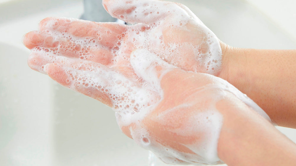 Close up of washing hands with soap